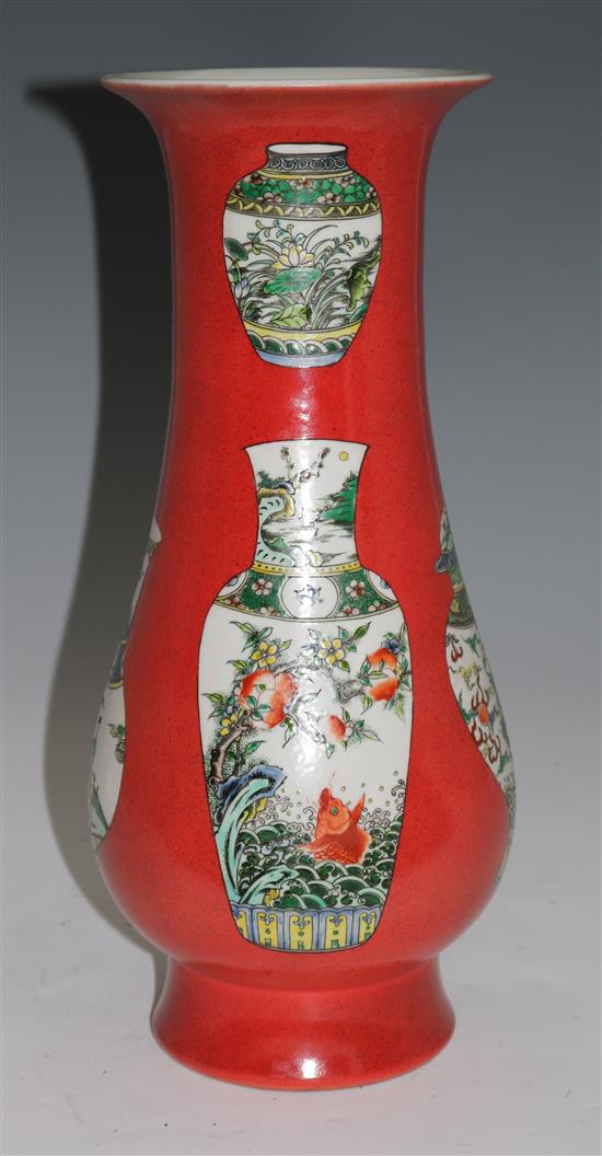 A Chinese coral ground famille verte vase, 42cms
